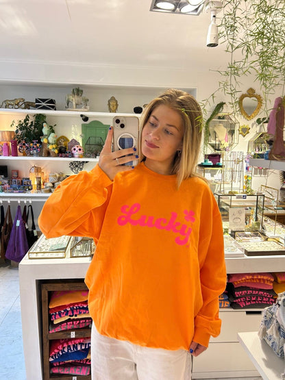 NIEUW Trui: “Lucky” Oranje met Neon Roze